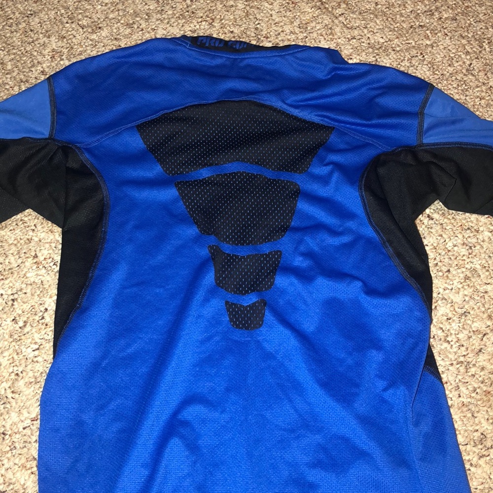 Blue Nike pro combat dri fit shirt